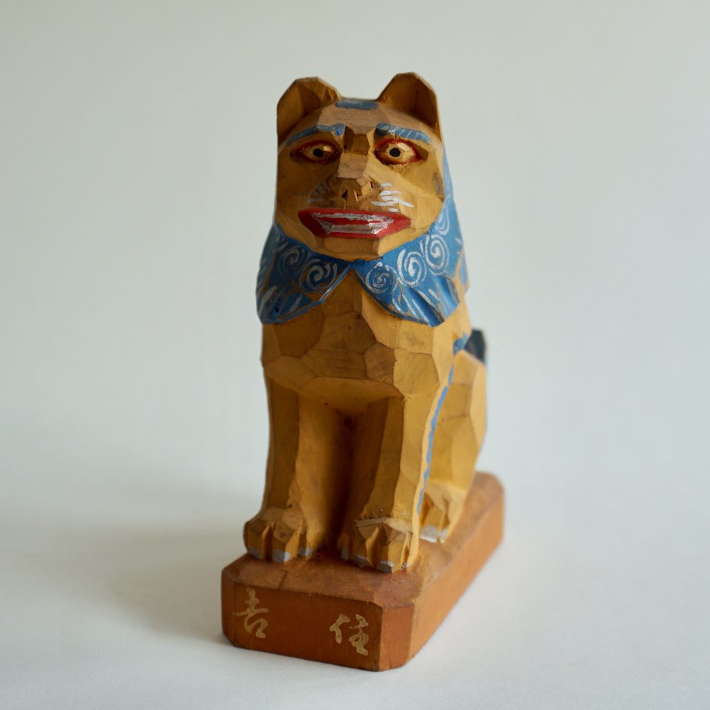 This is a wooden lion figurine made with a single stroke of the sword from Sumiyoshi Shrine in Osaka.